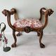 Neo-Renaissance banquette style with lion heads