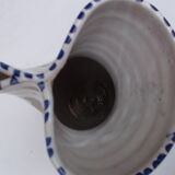 Decorated earthenware pitcher