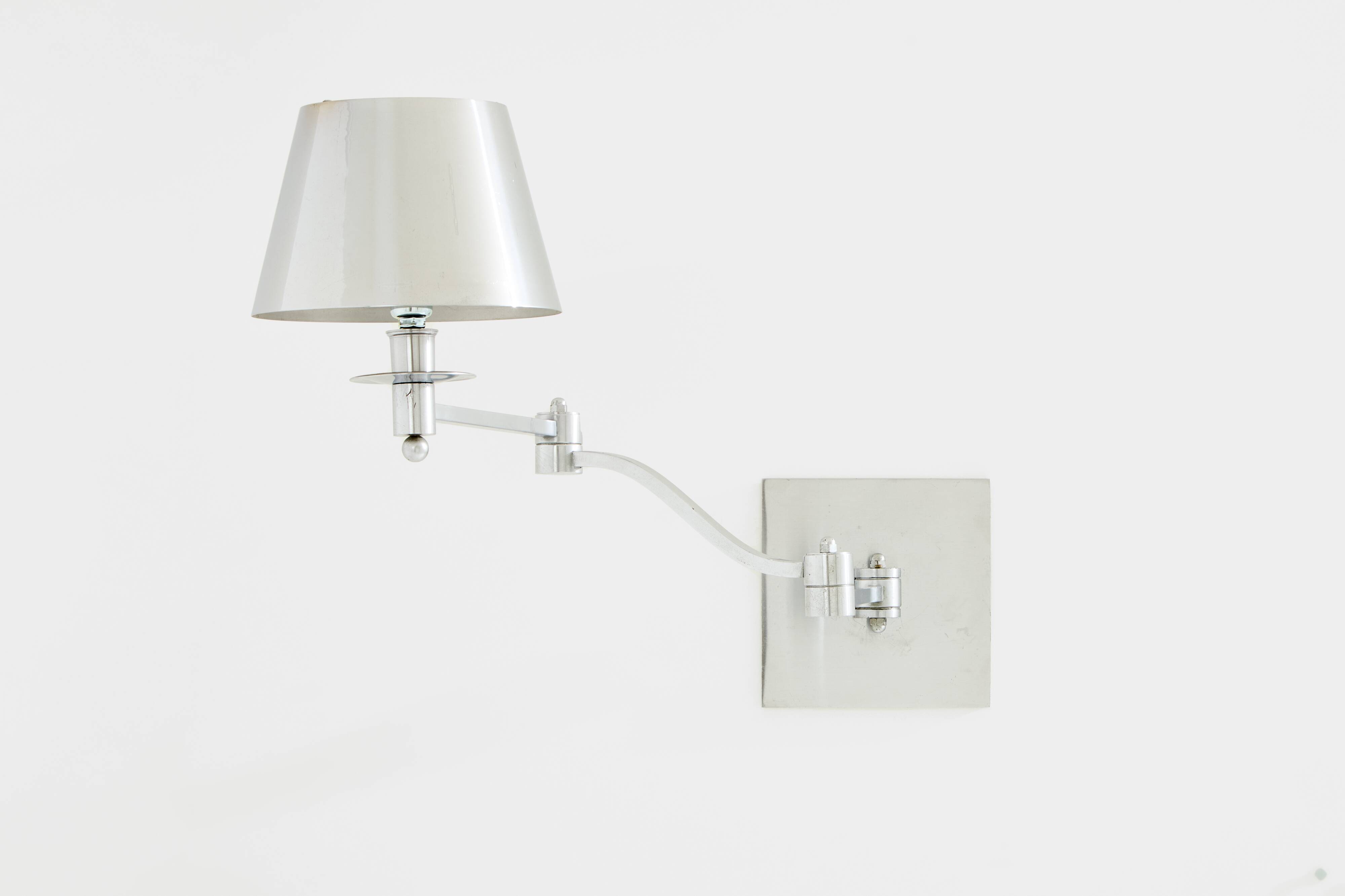 Maison Charles adjustable wall light, brushed steel, circa 1960