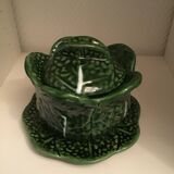 1 small bowl of cabbage with its plate underneath