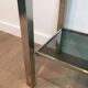 Beautiful console table in brushed metal with bluish glass shelves