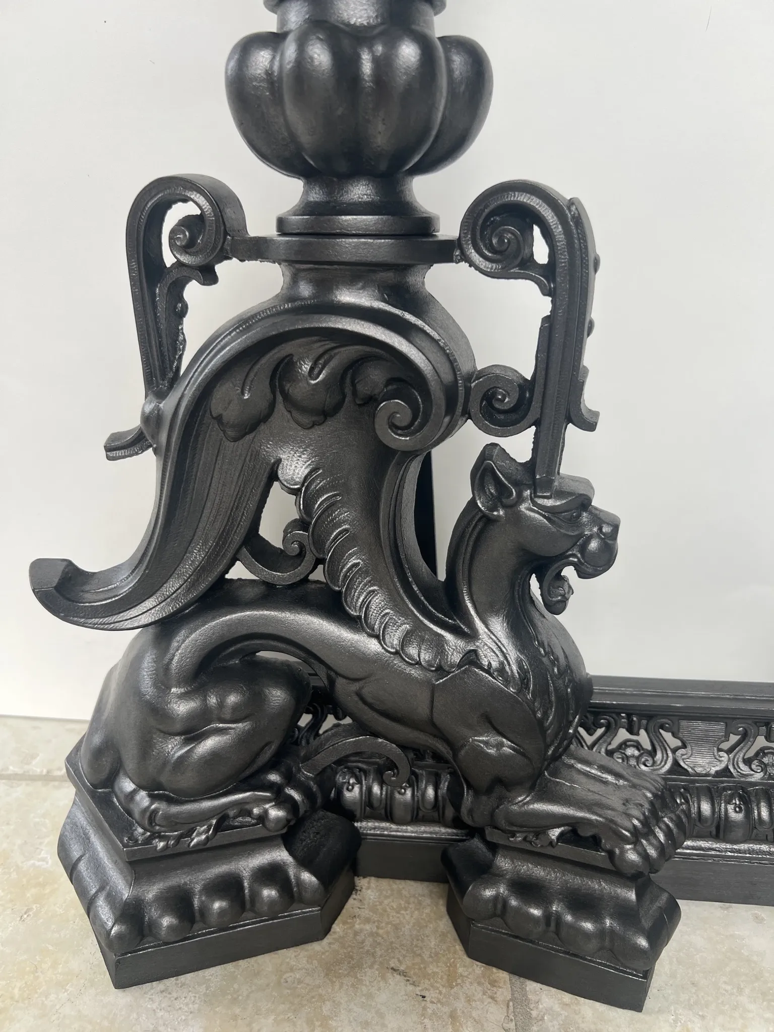 19th-century cast iron fireplace set, bar, andirons & plaque with griffins