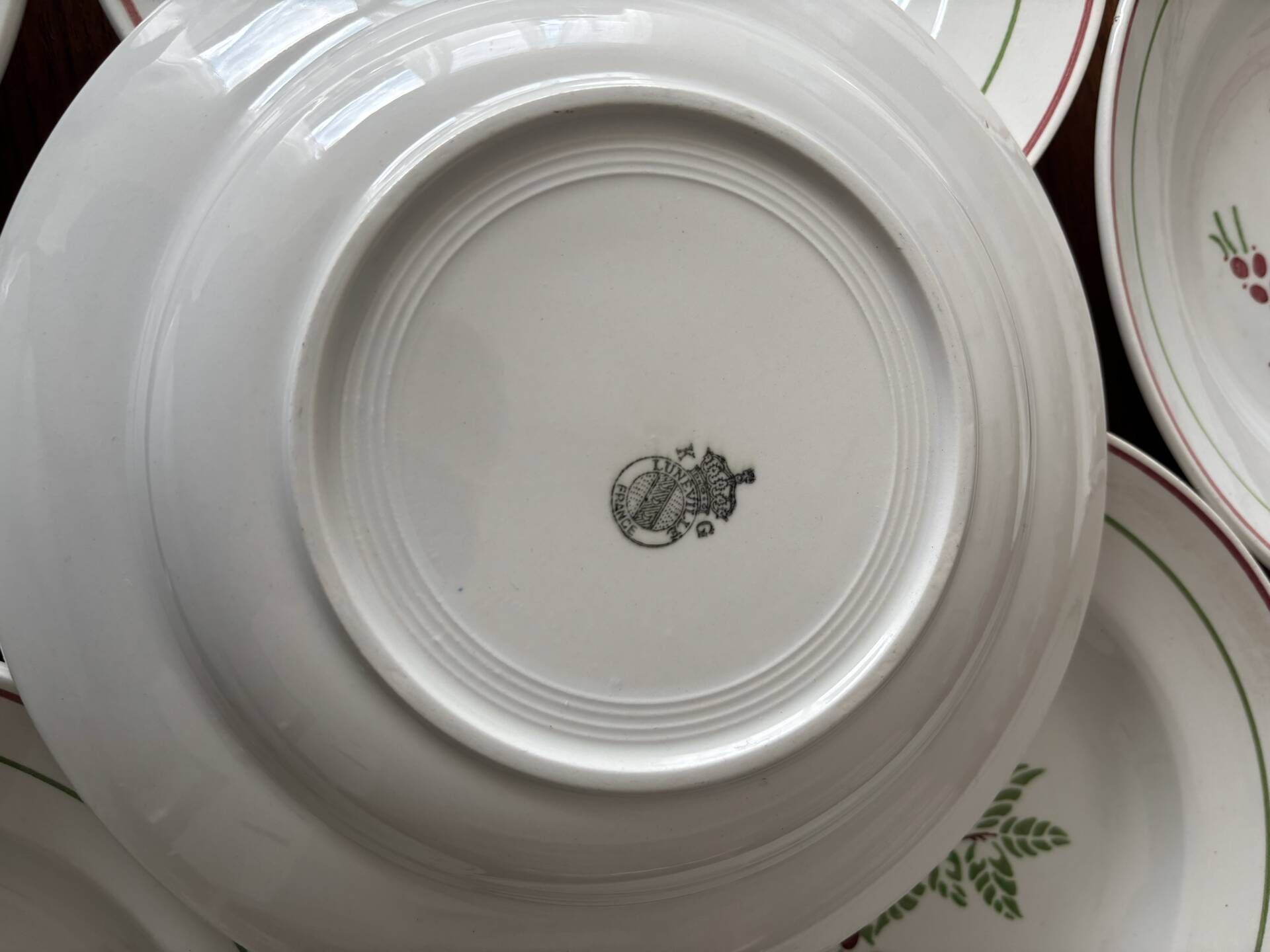 Set of 8 antique deep plates KG Lunéville, floral berry decoration.