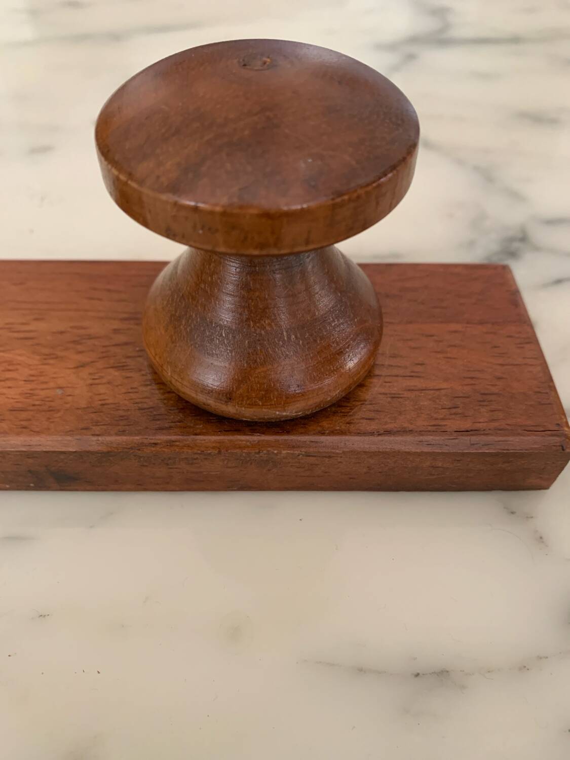 Wooden wall-mounted coat rack