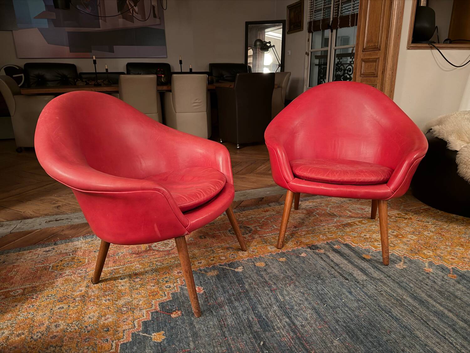 2 Hans Olsen armchairs, 1950s, red leather finish.