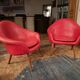 2 Hans Olsen armchairs, 1950s, red leather finish.