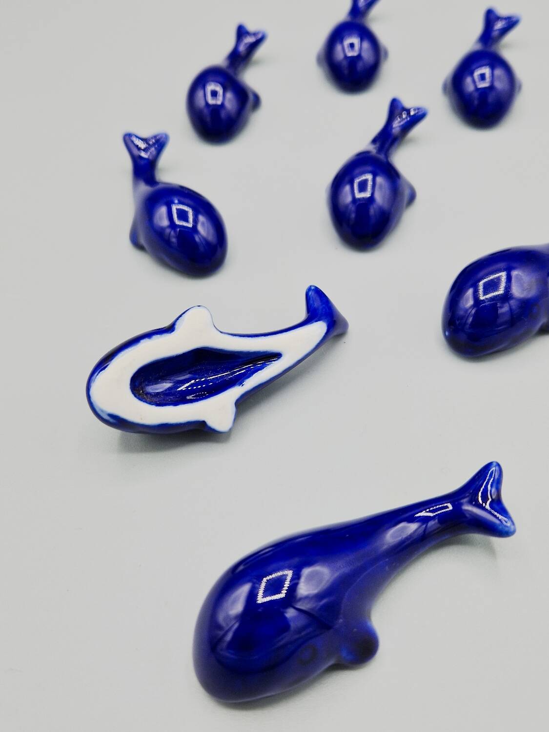 Set of 6 vintage blue porcelain whale knife rests.