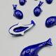 Set of 6 vintage blue porcelain whale knife rests.
