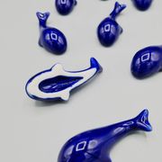 Set of 6 vintage blue porcelain whale knife rests.