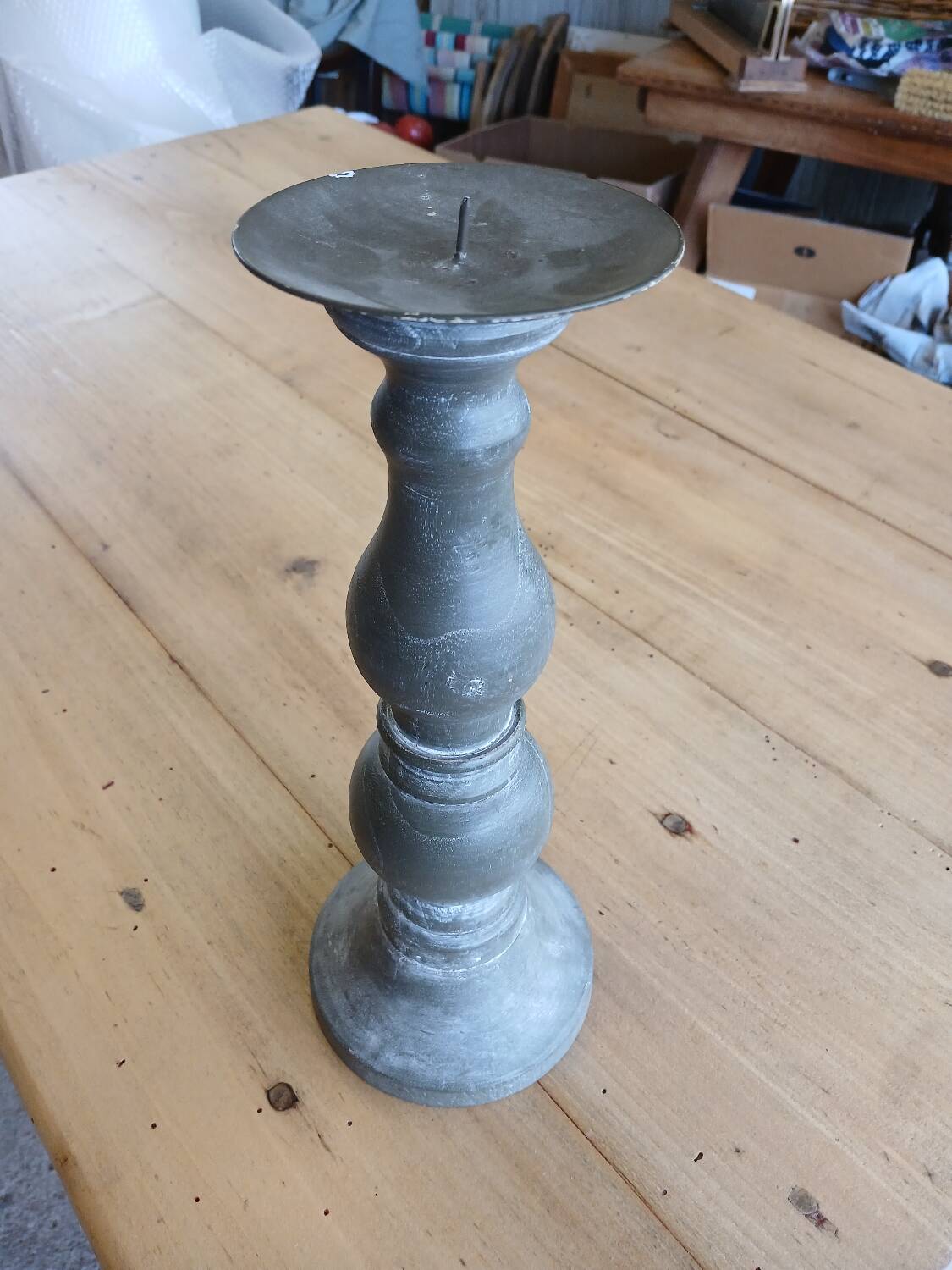 Candle holder in patinated wood