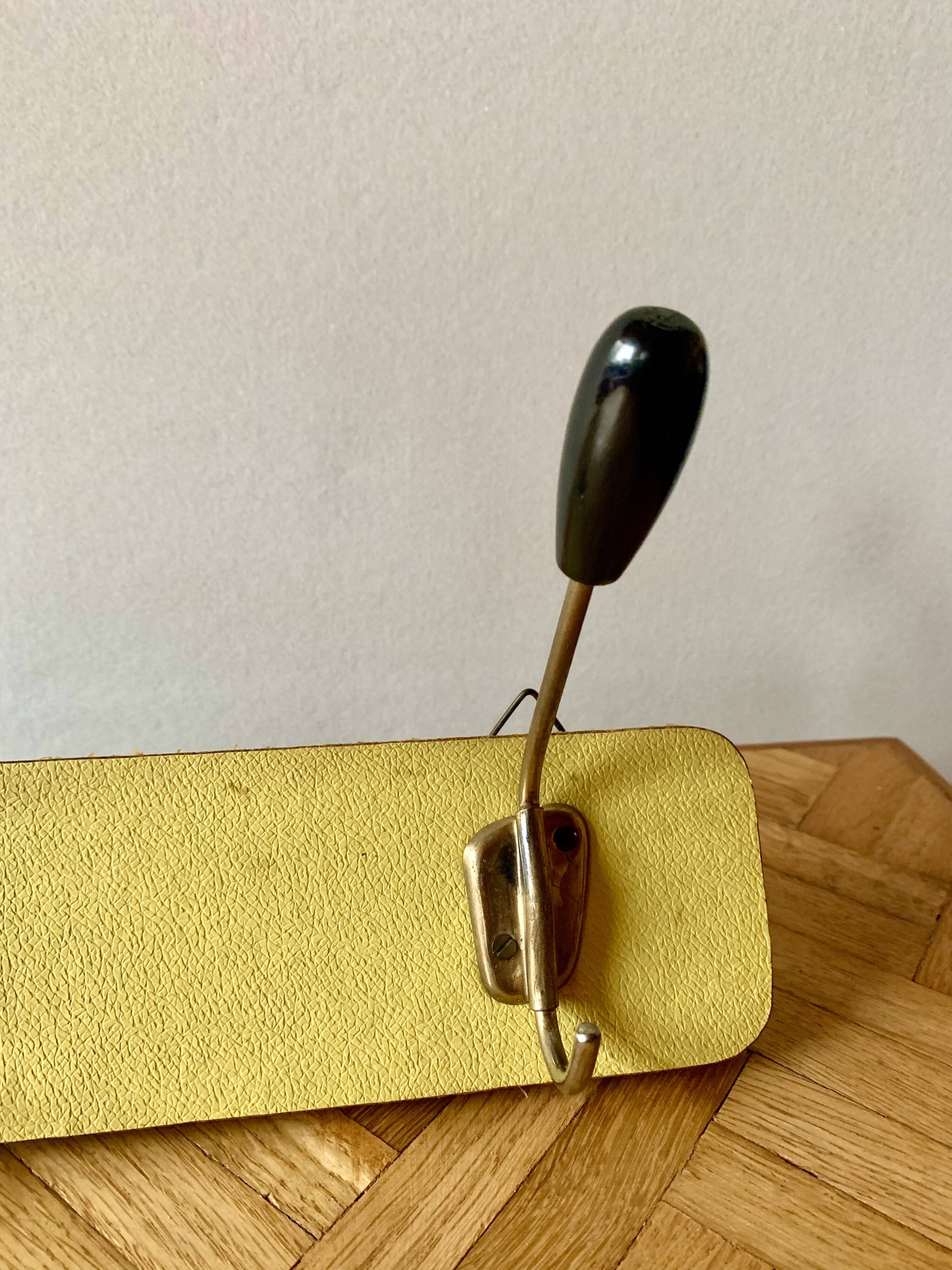 Vintage yellow wall coat rack - four hooks - 1950s