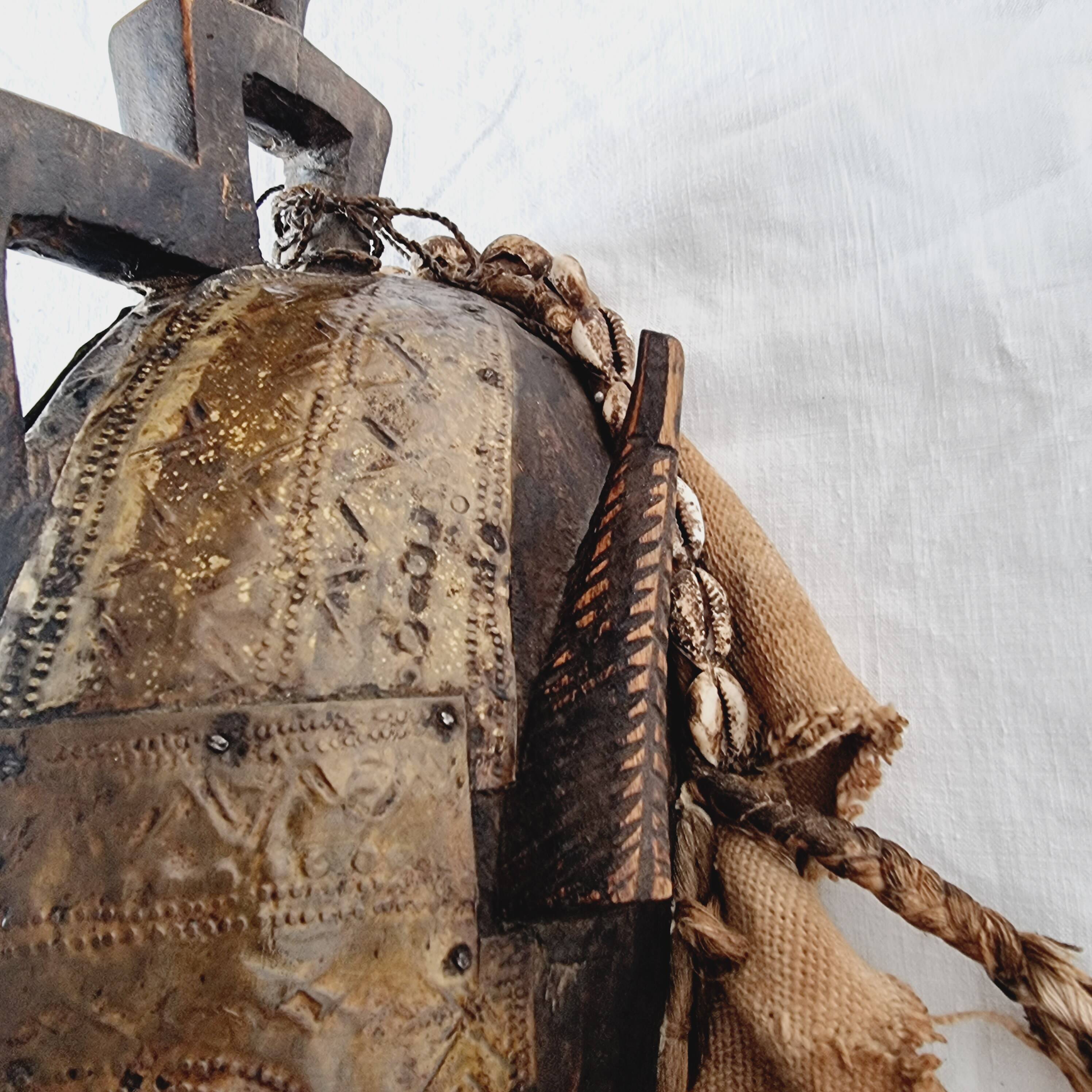 African mask from Mali from the N'Tomo tribe of Marka covered in chiseled brass