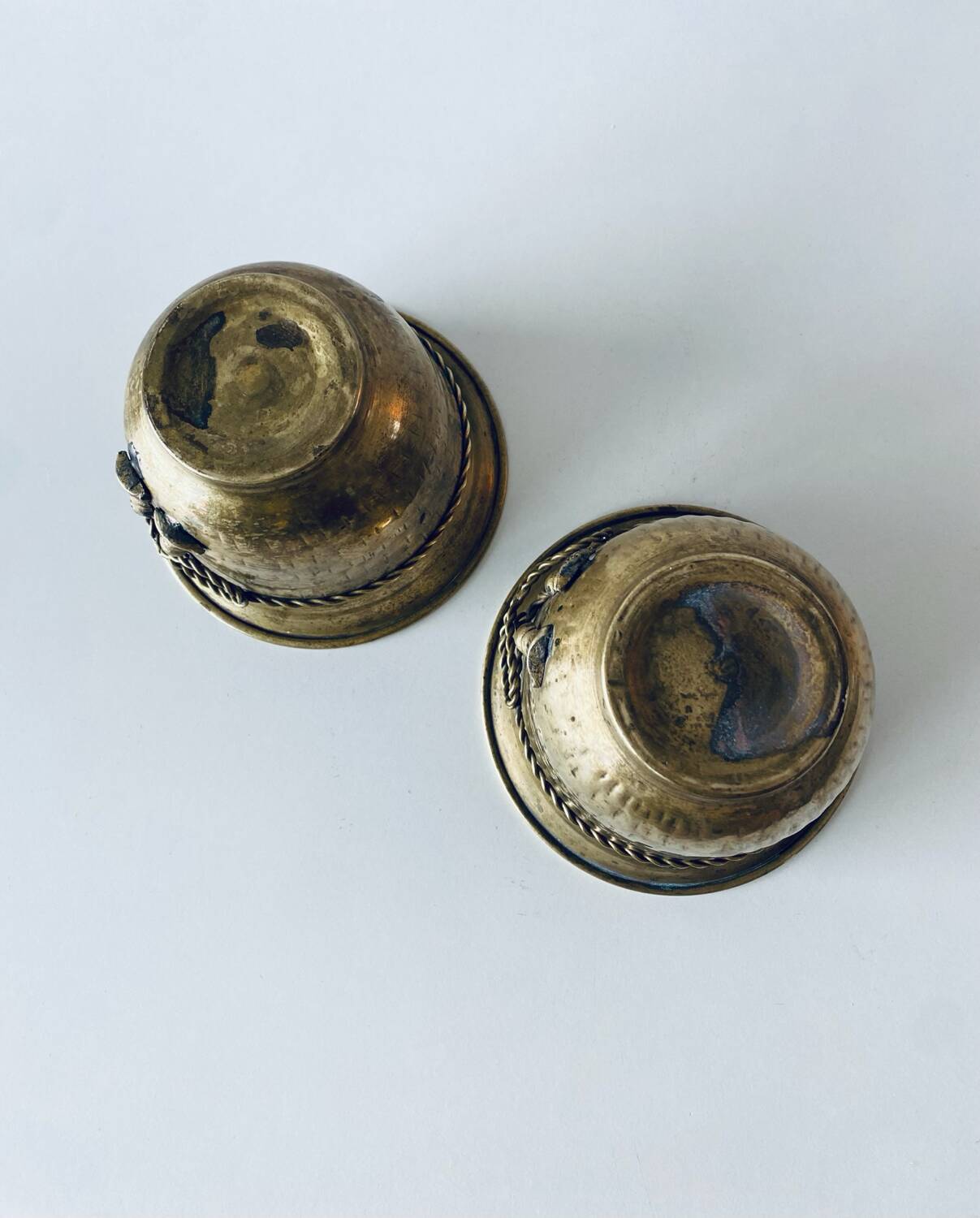 Pair of brass cord pot covers
