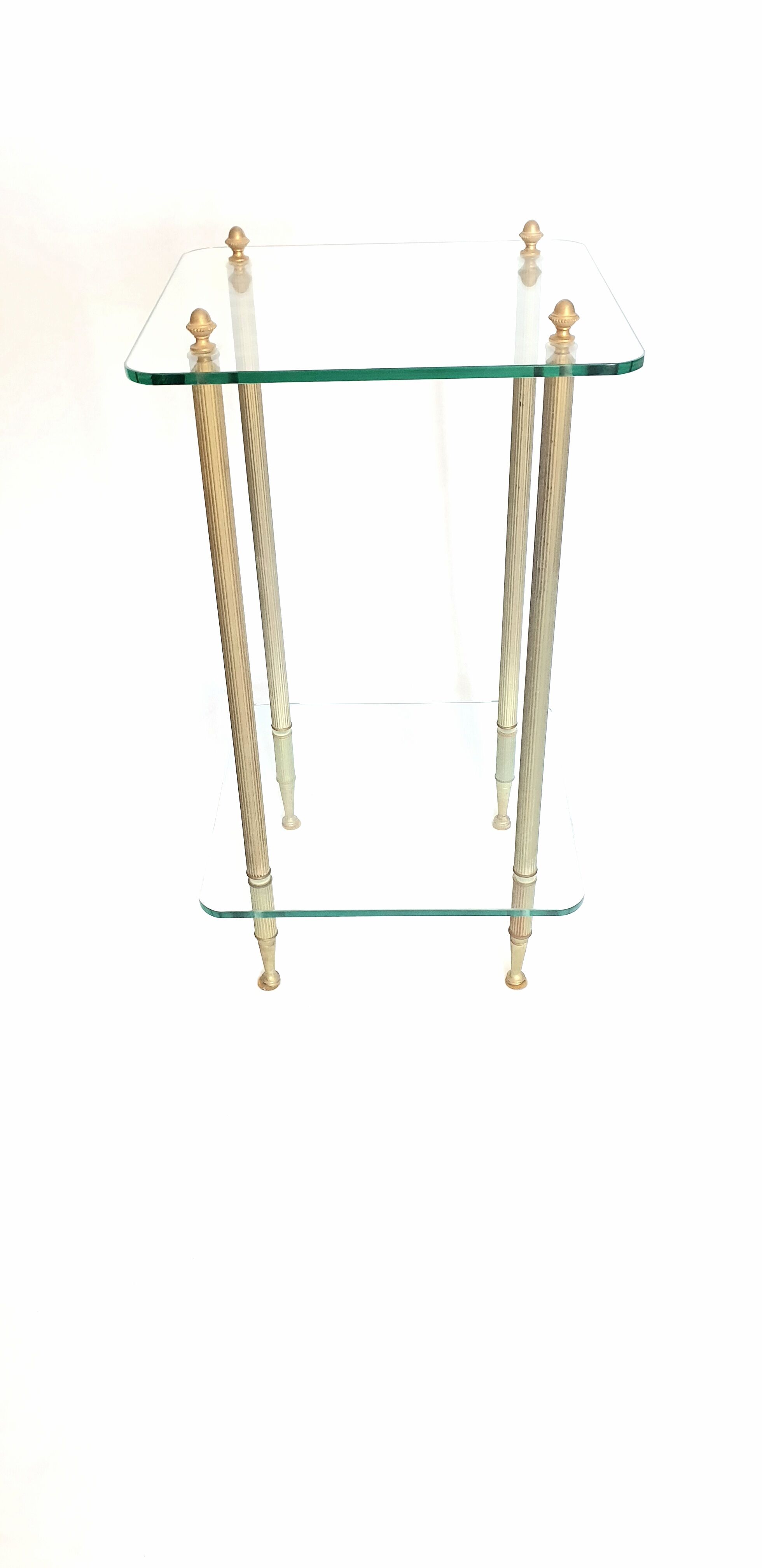Side table in glass and brass