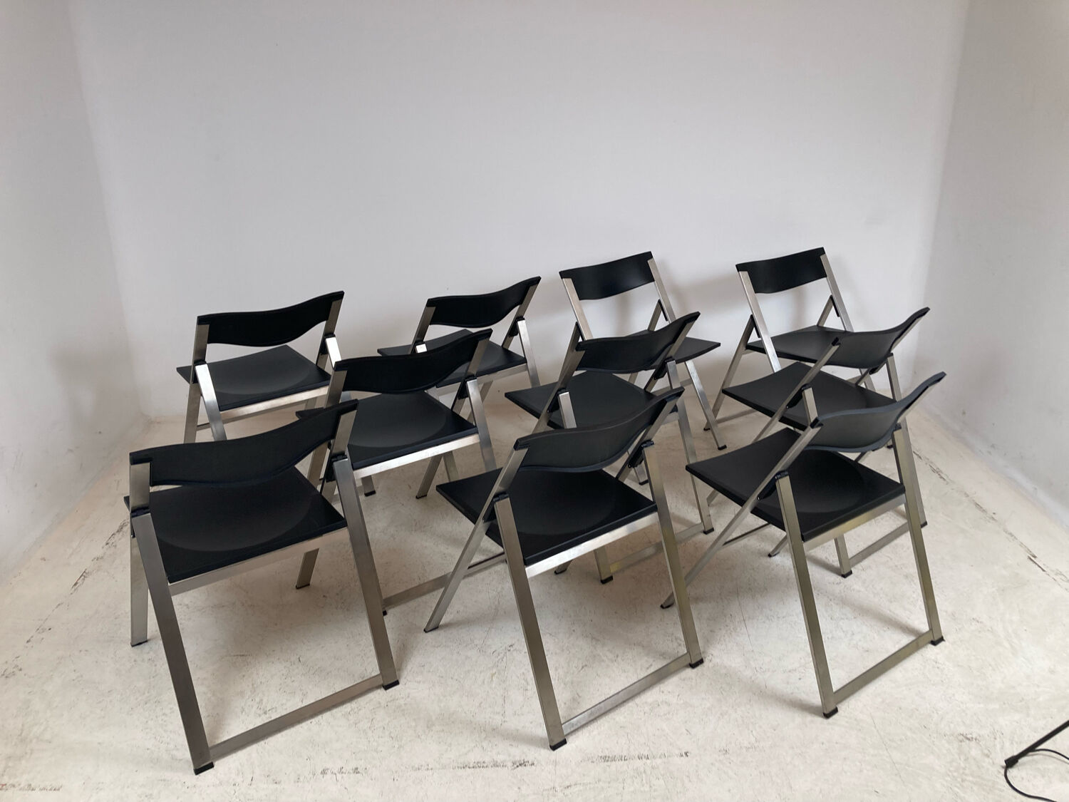 P08 folding chairs by Justus Kolberg for Tecno 1991