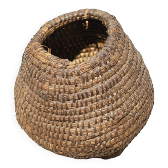 Old basket, burgundy straw and bramble, woven basket, interior decoration