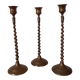 Lot de trois bougeoirs en laiton