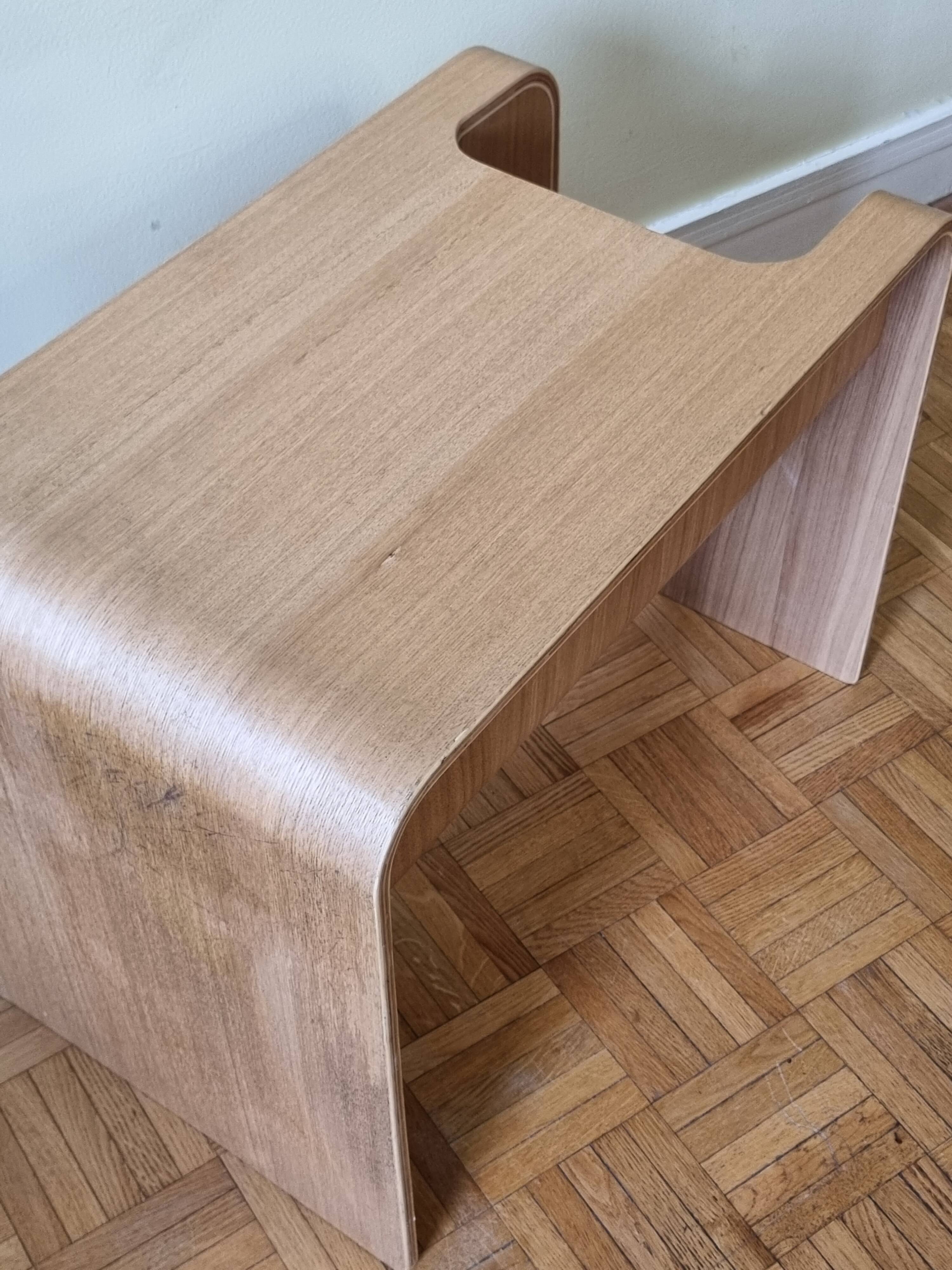 Boone coffee table in curved wood produced by Habitat, design