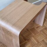 Boone coffee table in curved wood produced by Habitat, design