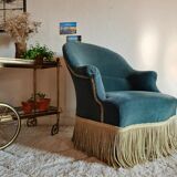 Green velvet toad armchair with fringes