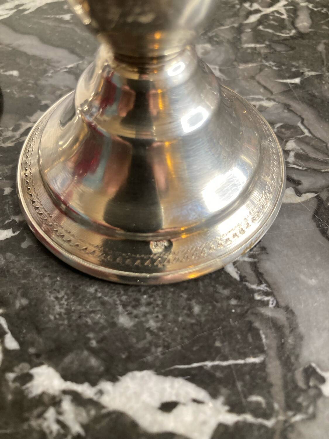 Pair of silver metal candlesticks