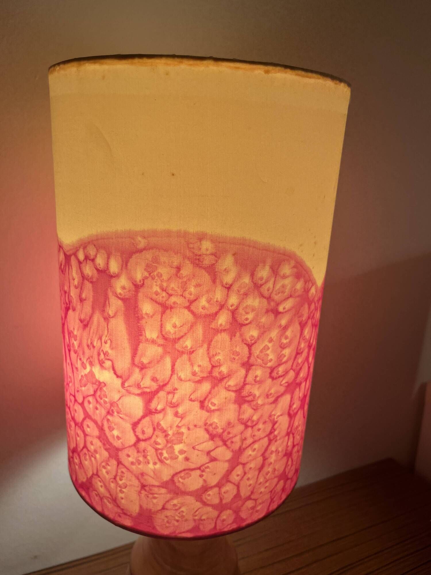 Vintage lamp with a carved wooden base from the 1970s.