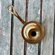 Brass hand candlestick