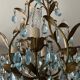 Antique Italian chandelier with cage and blue tassels