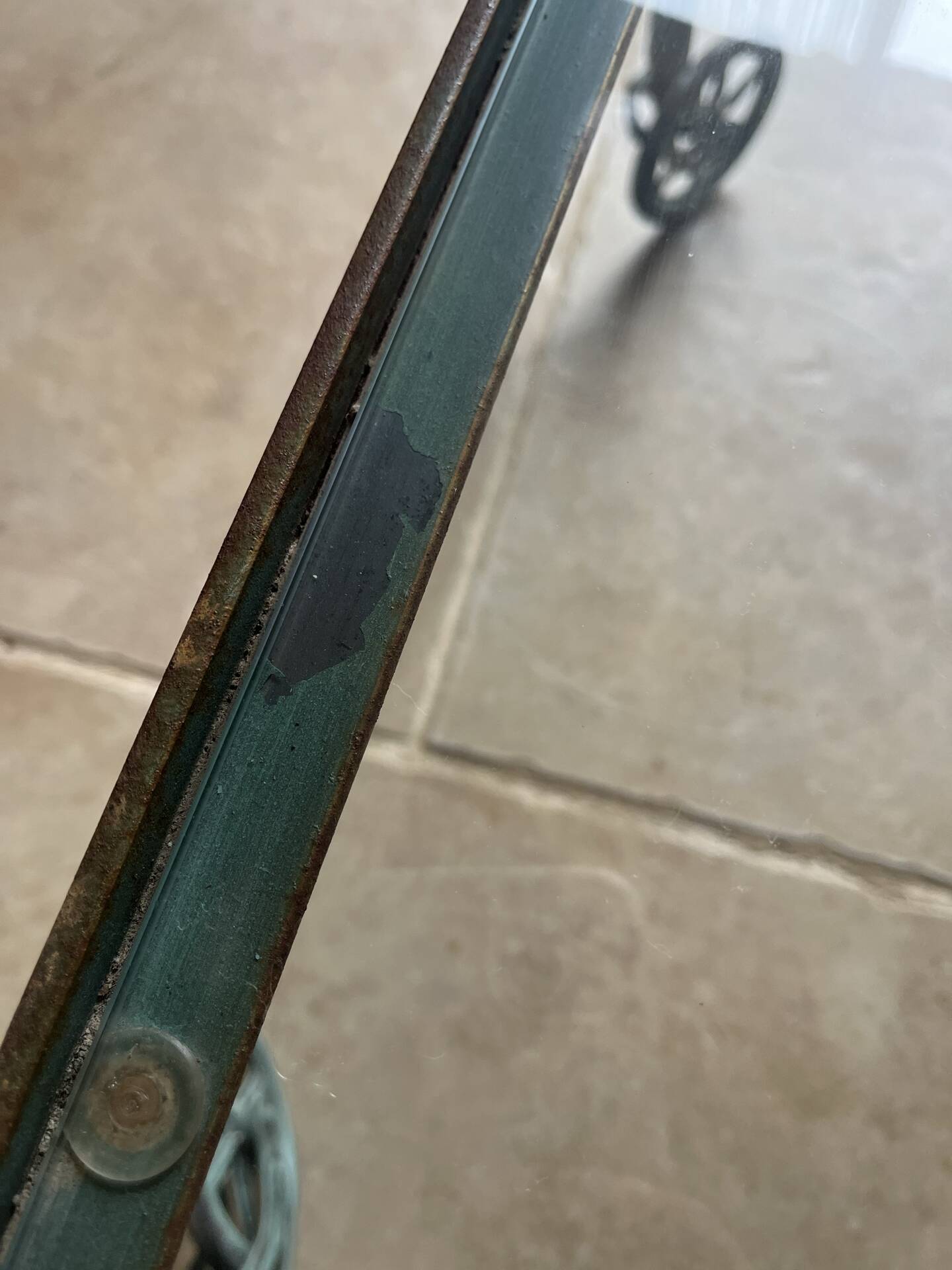 Patinated green-grey wrought iron dessert table
