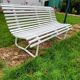 Antique garden bench with metal legs