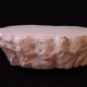 Design coffee table with travertine rock effect — unique piece hand-sculpted.