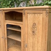 Asymmetrical Art Deco glass-fronted Parisian wardrobe in raw oak, 1930.