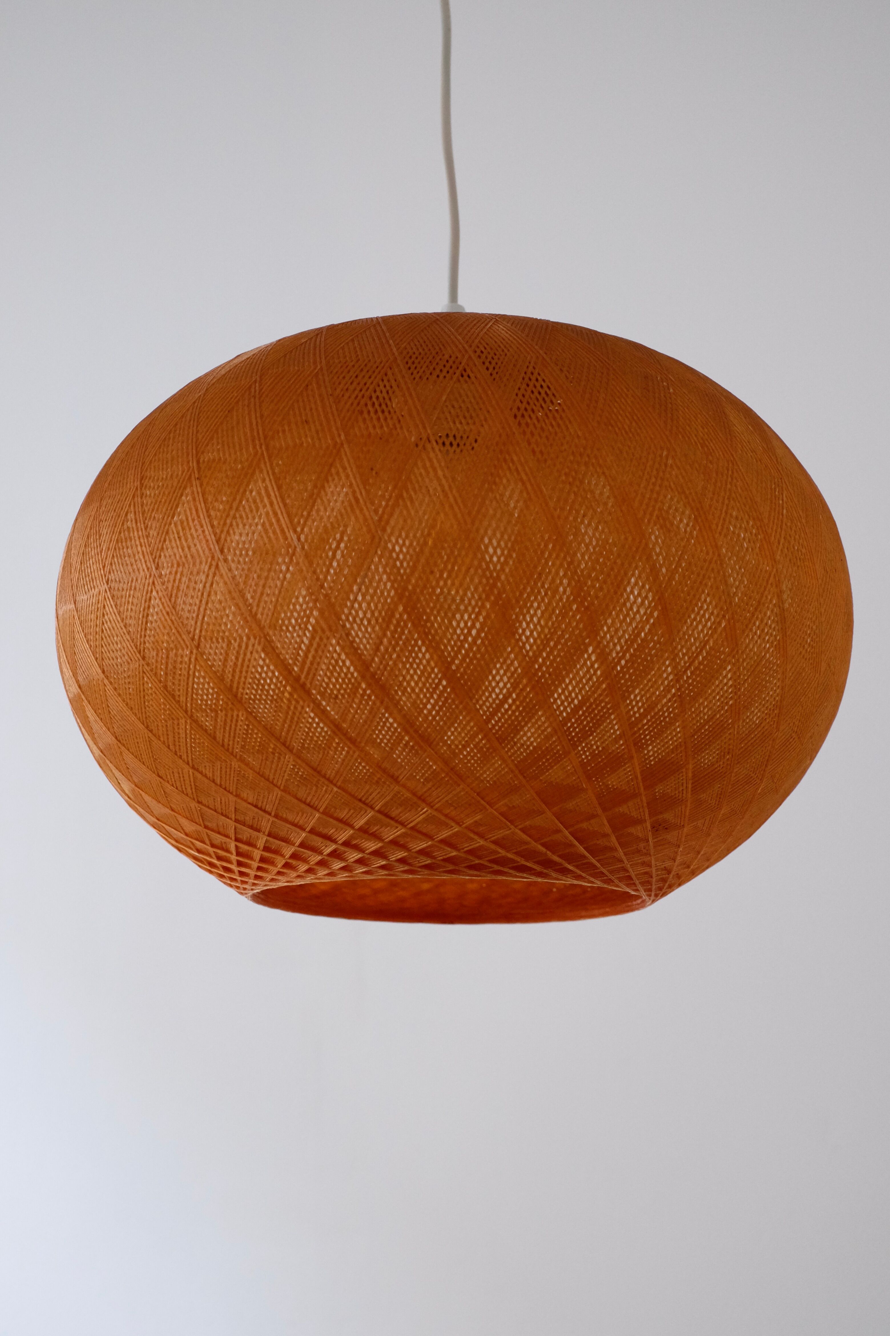 Suspension cocoon in nylon thread stretched thread rhodoïd