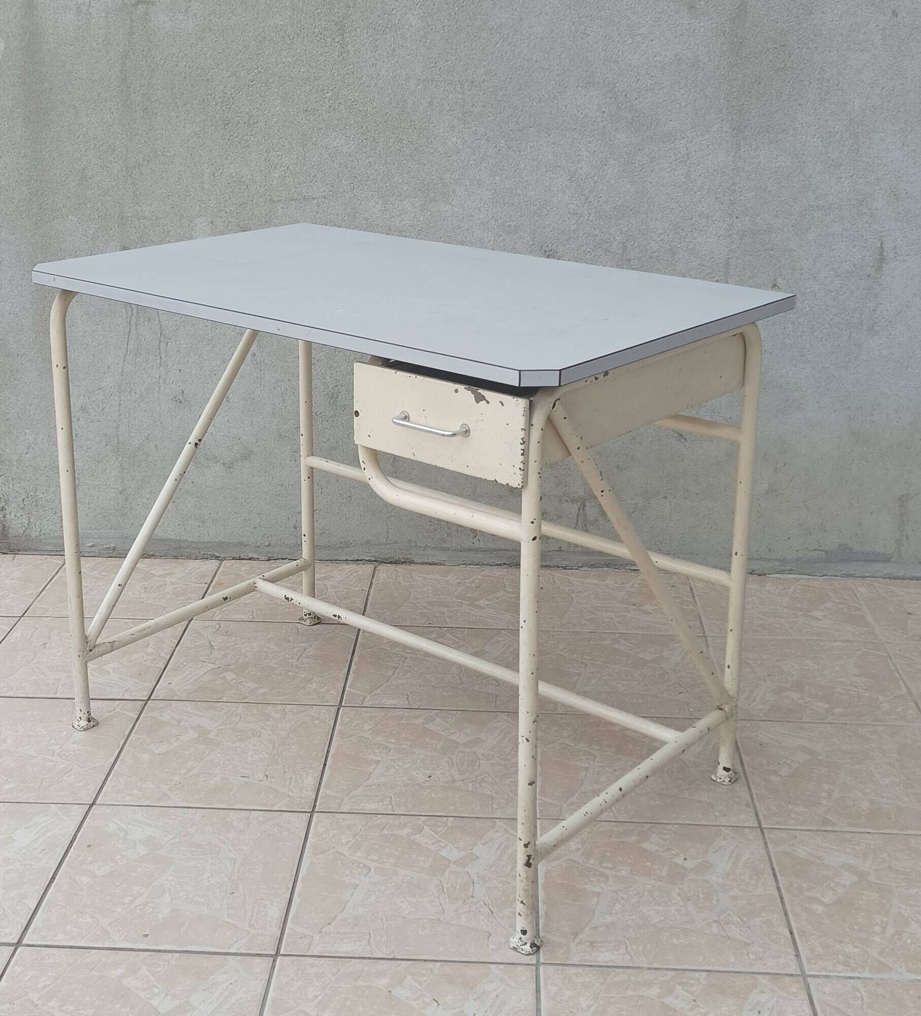 Industrial high table made of metal and formica.