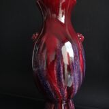 Beef blood vase decorated with taoties and flaming, China, 34cm, 19th century