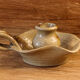Signed sandstone candle holder