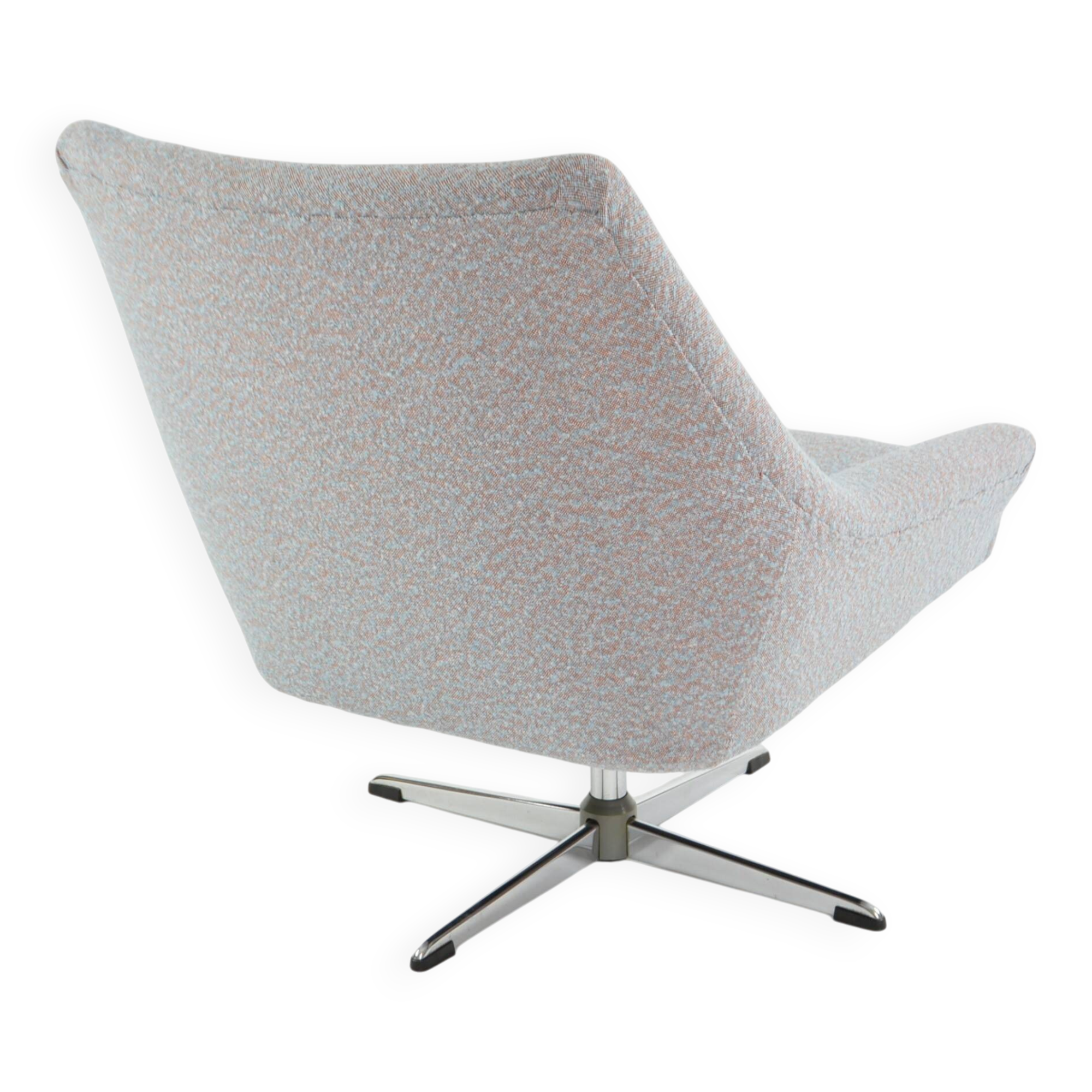 Modernist shell armchairs from the 1970s.