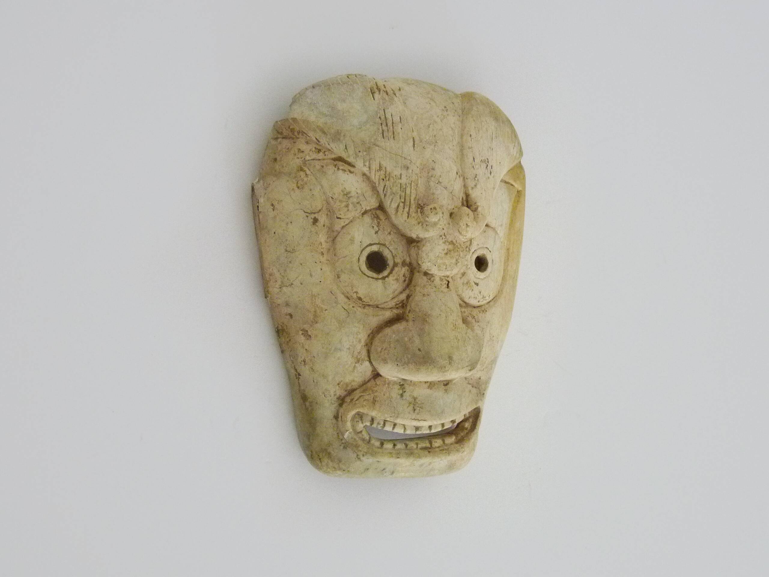 Netsuke old large bone mask japan grimacing character. 19th century