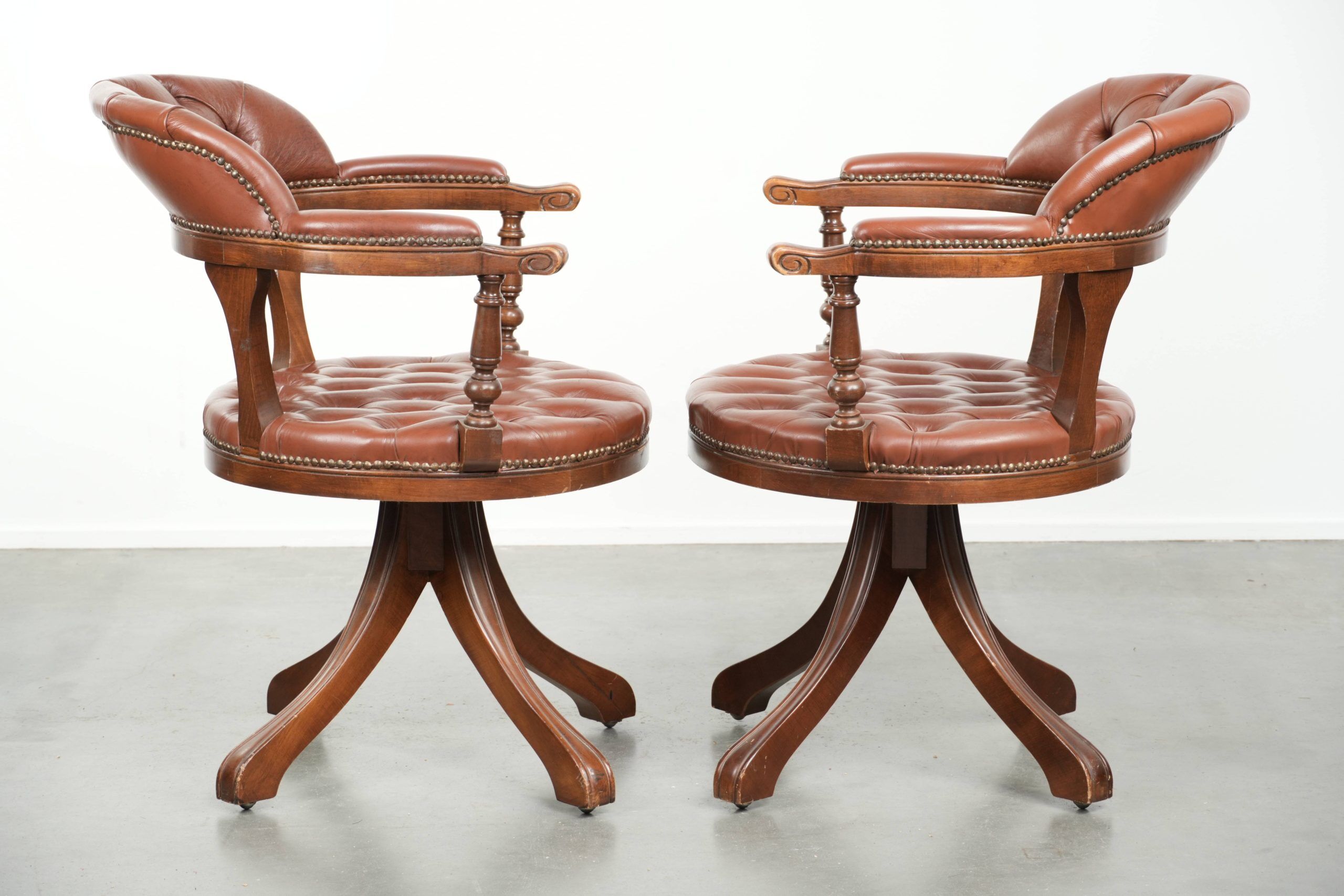 Set of 2 swivel cowhide English style chesterfield office chairs