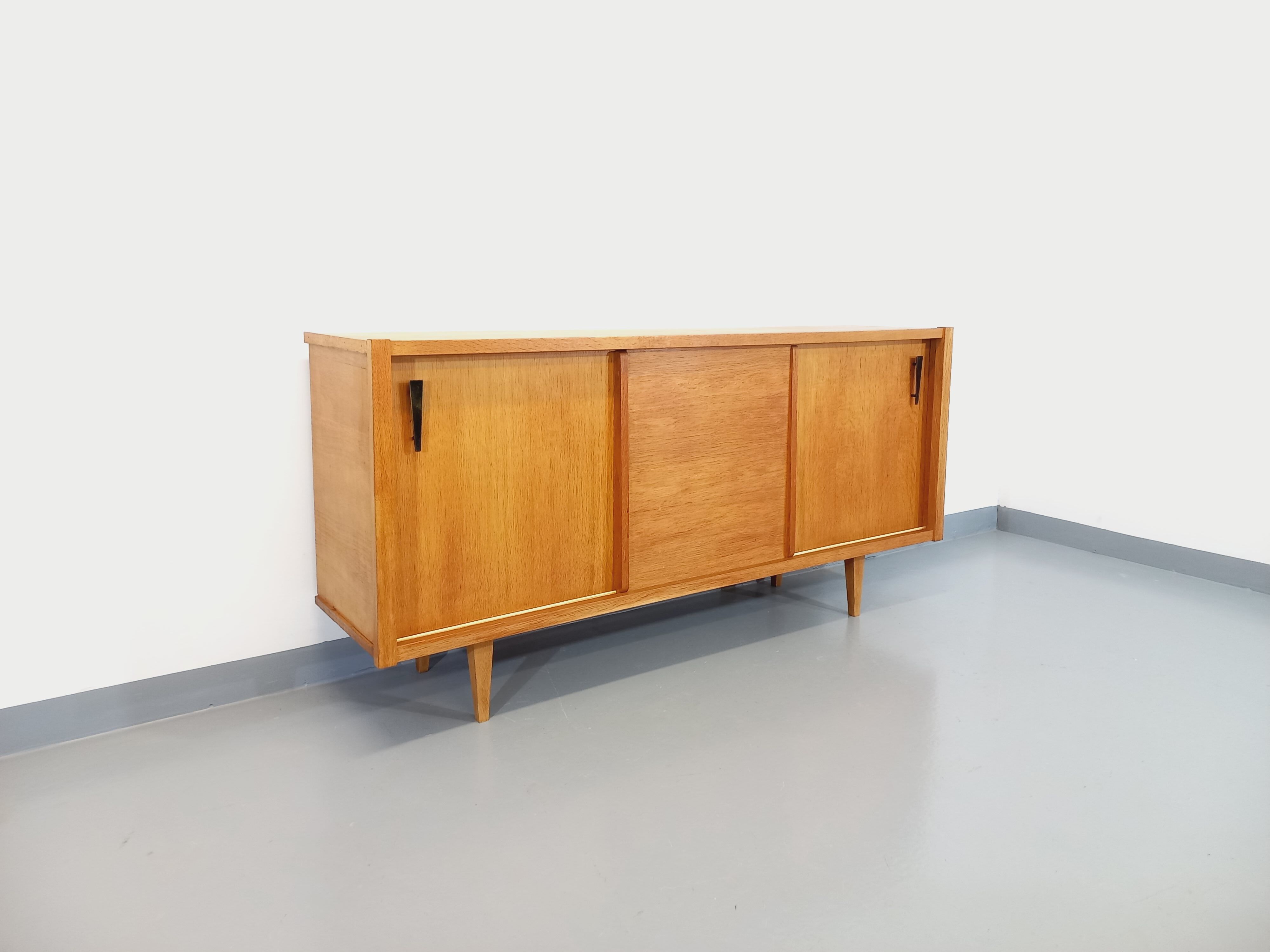 Vintage row in light oak wood from the 60s