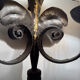 Large lily flower wrought iron wall light from the 1960s.