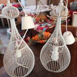 Pair of white metal pendant lights