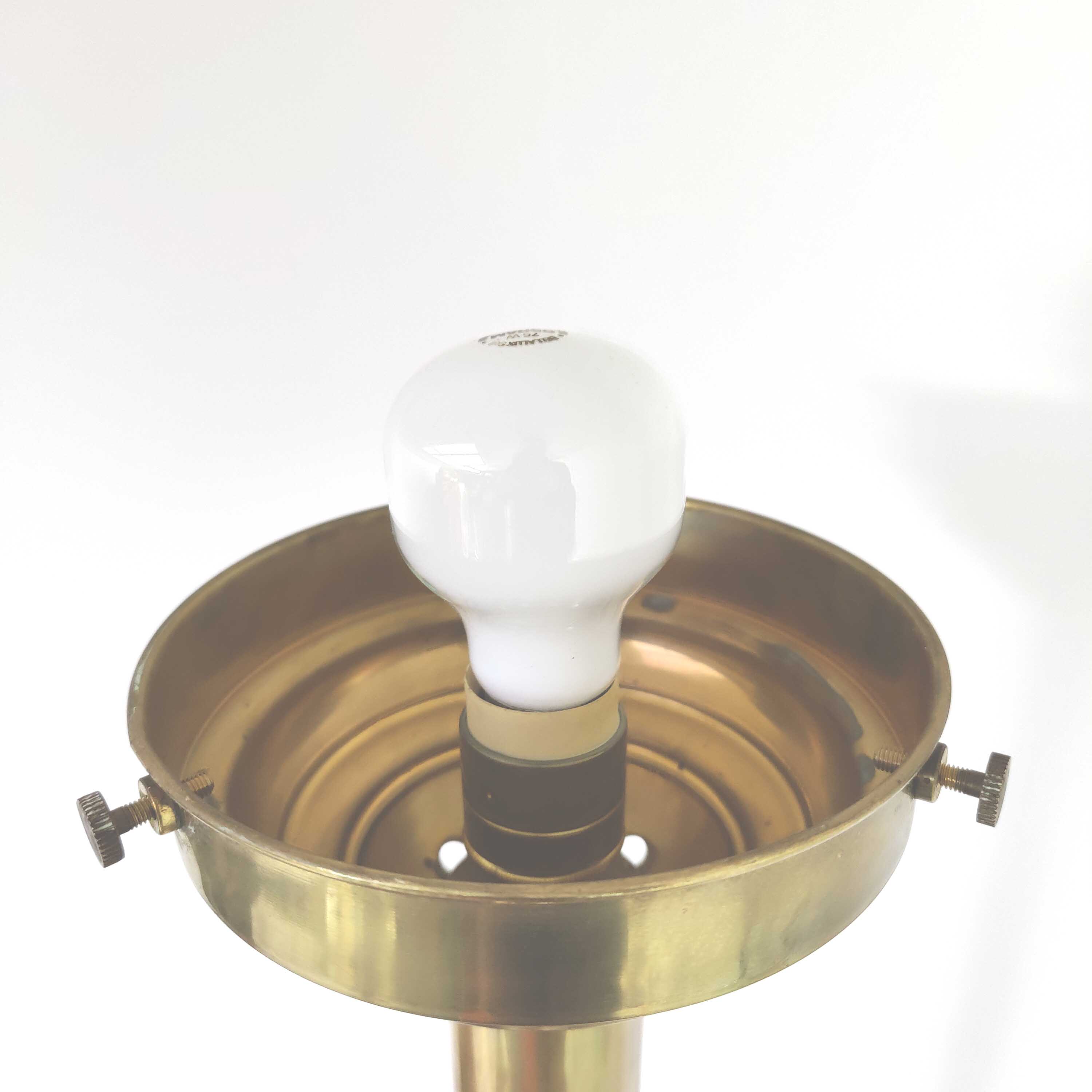 Brass brasserie floor lamp with opaline glass globe