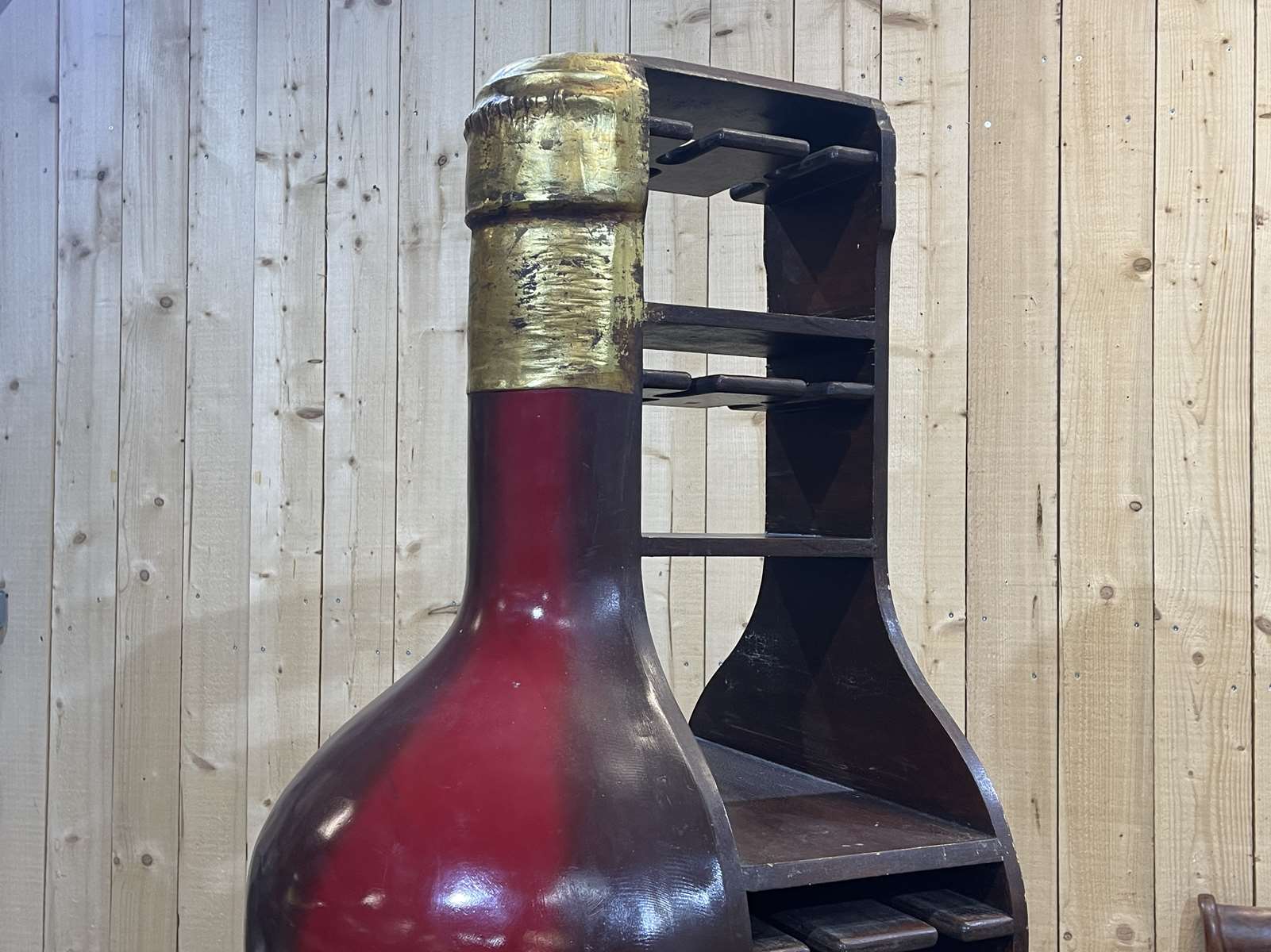 Advertising bar furniture in the shape of a giant wine bottle 90s