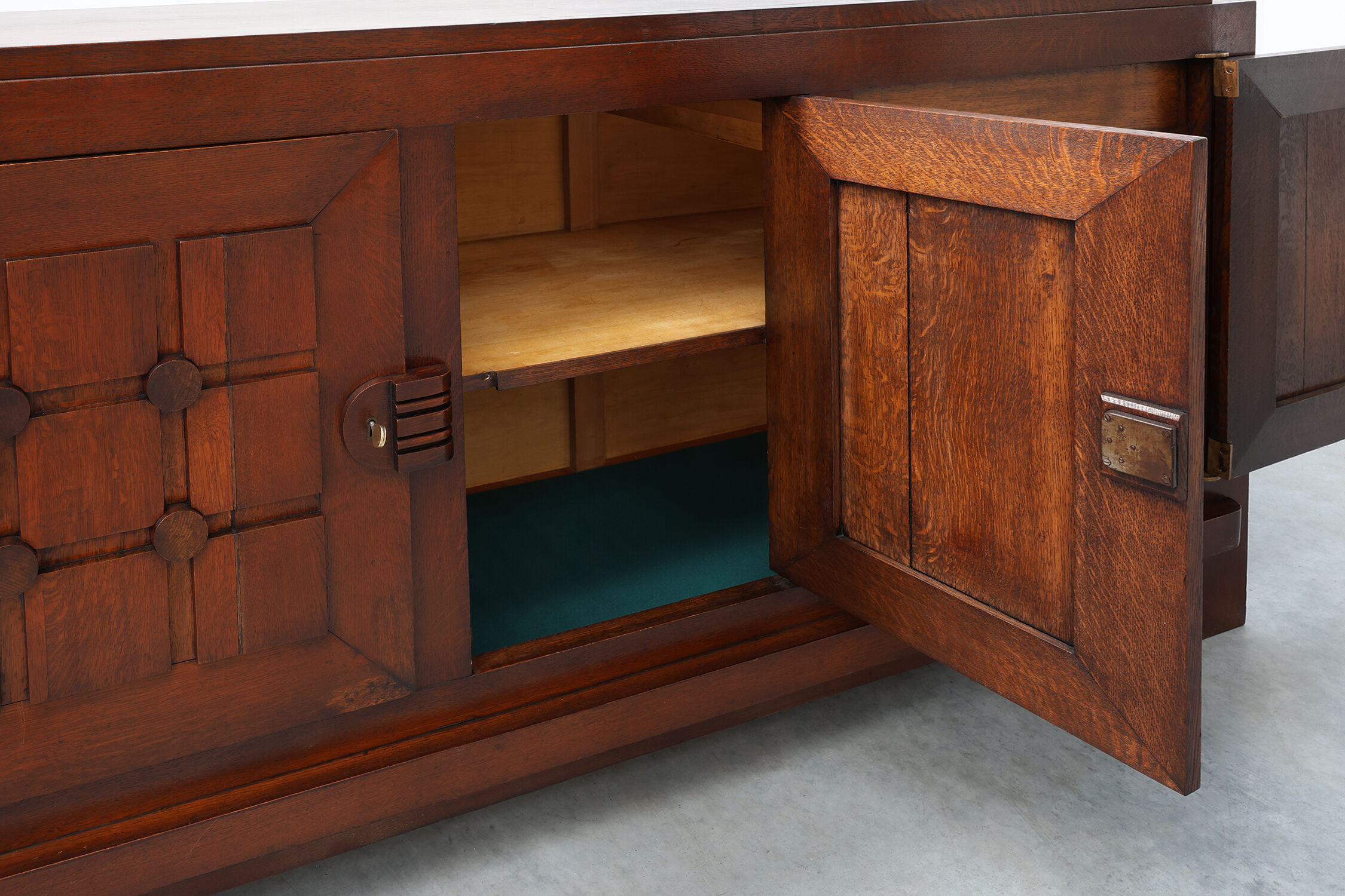 Art Deco carved geometric sideboard by Charles Dudouyt in oak, France ca. 1