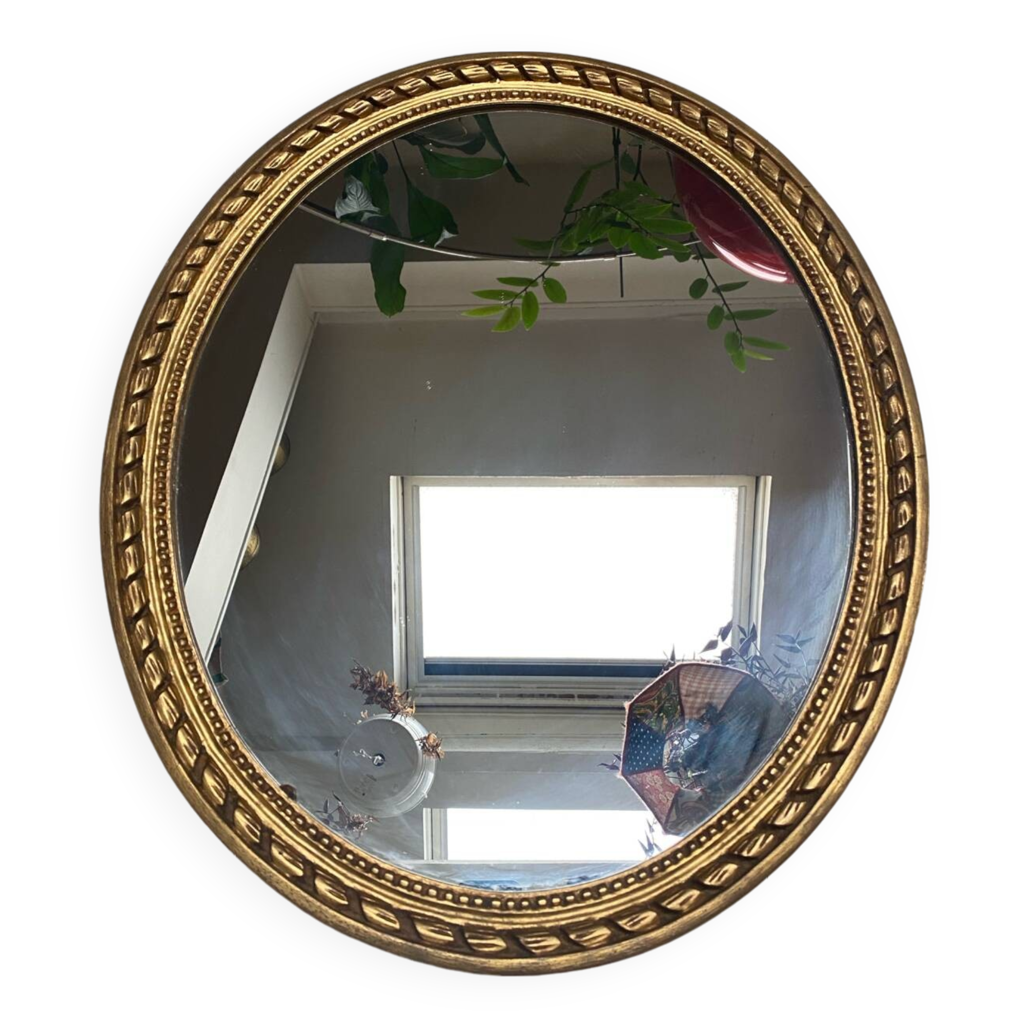 Large oval mirror in wood gilded with fine gold