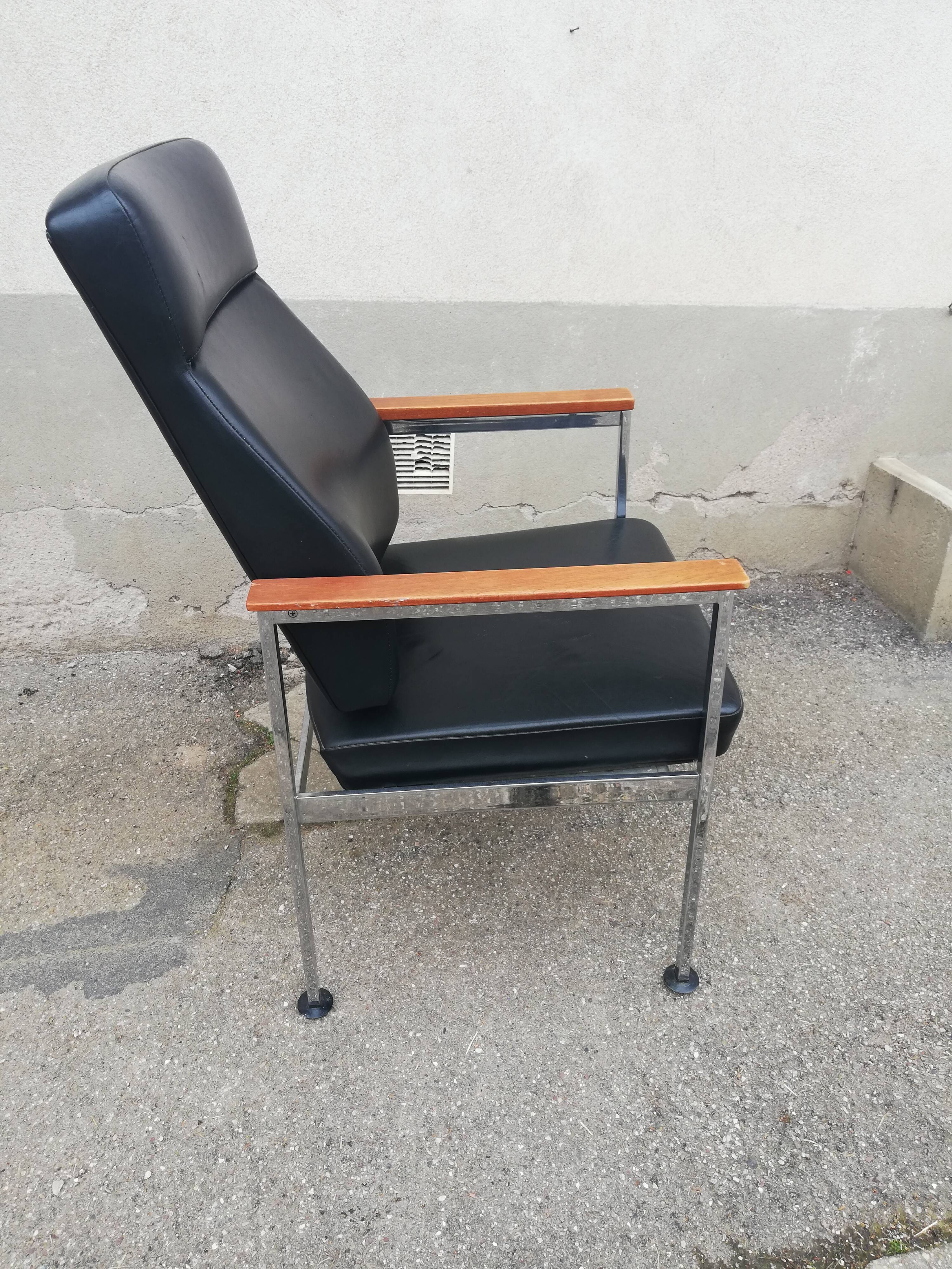 Vintage leather and teak armchair