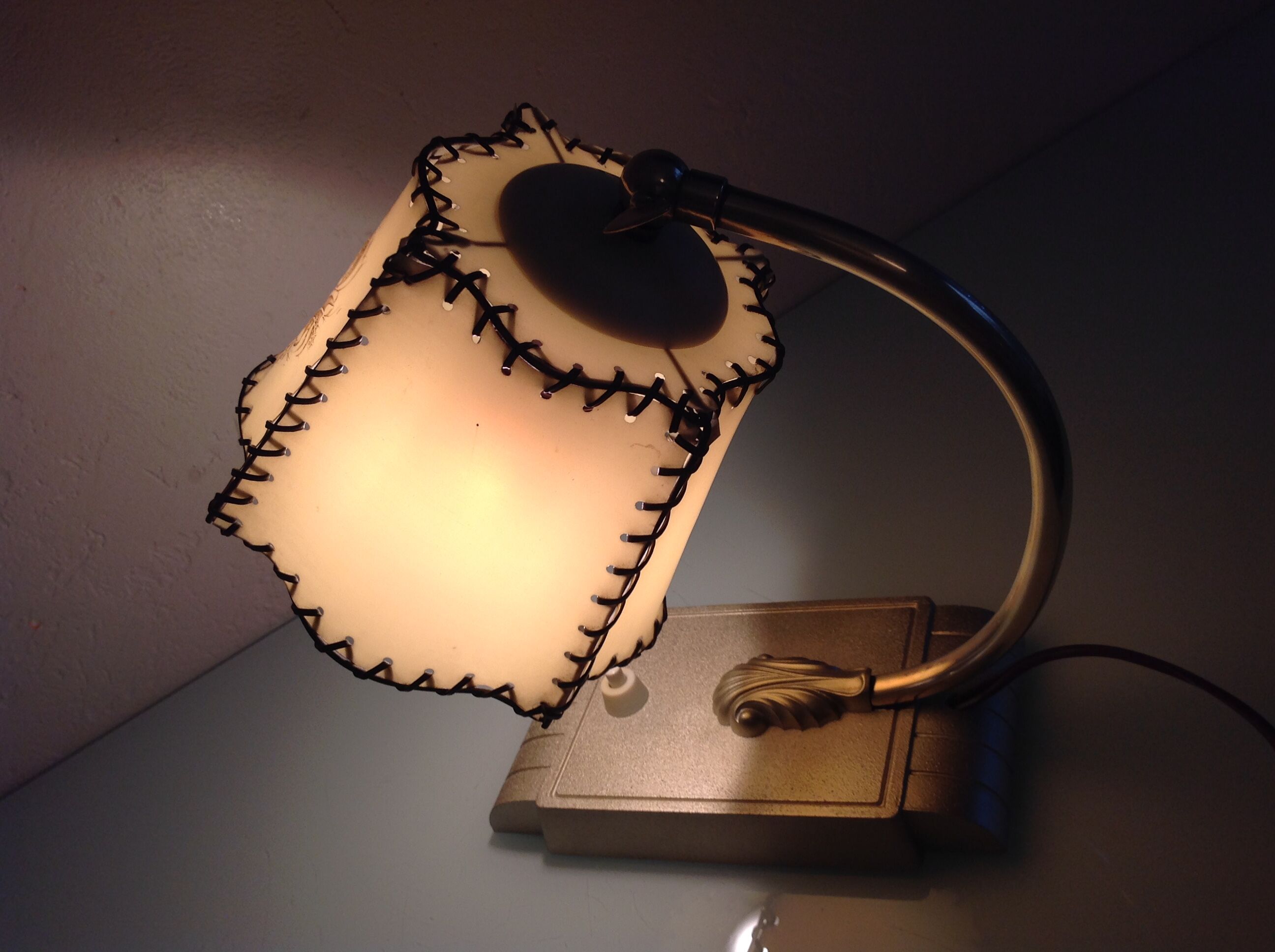 Brass bedside lamp and beige lampshade art deco style