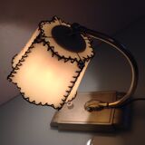 Brass bedside lamp and beige lampshade art deco style