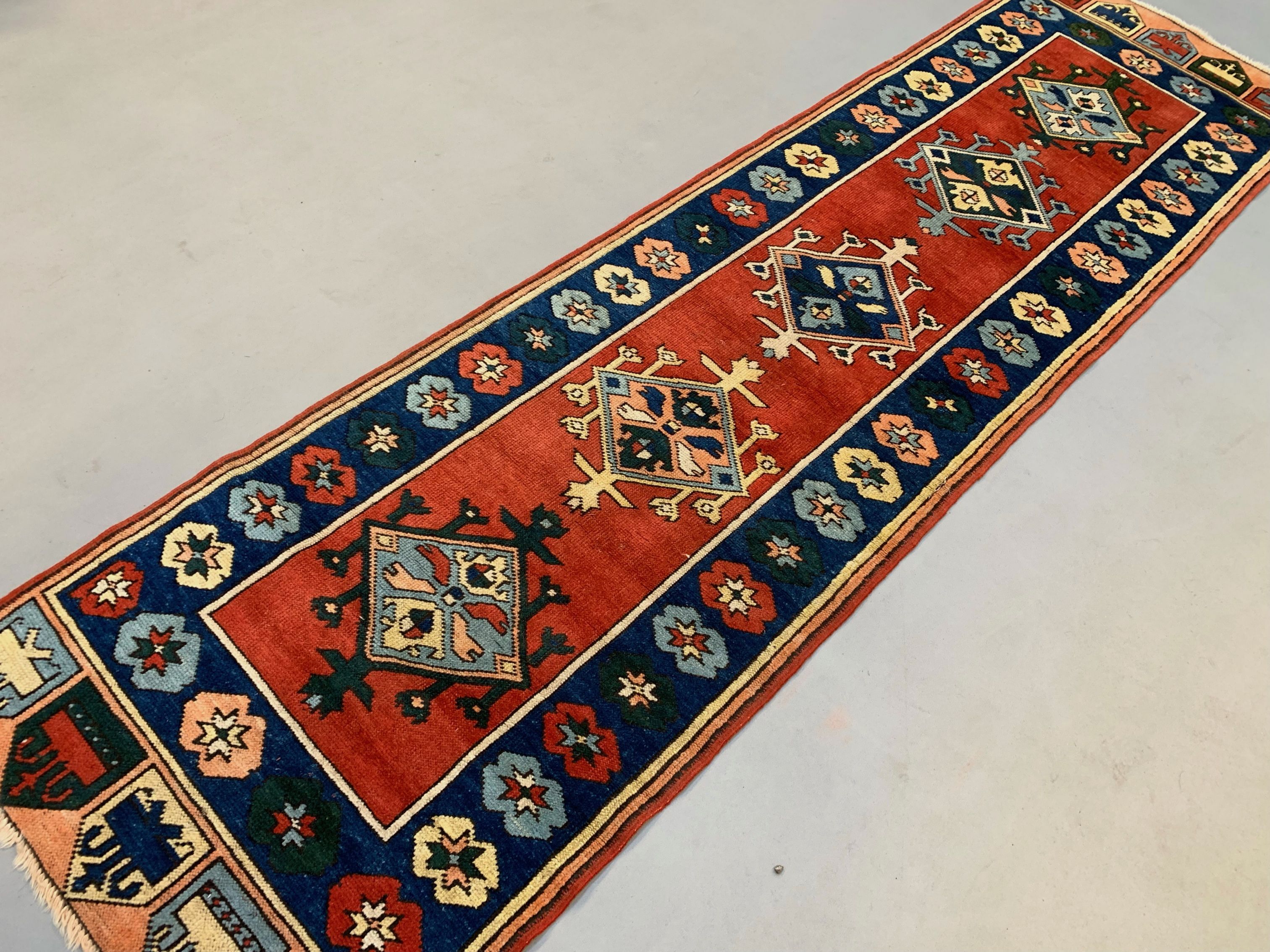 Vintage turkish runner 300x83 cm kazak rug, terracotta red, green, beige blue